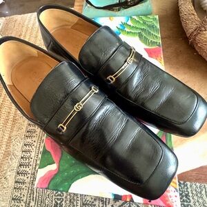 Gucci Square Toe Loafer and with a thin running G bar across shoe